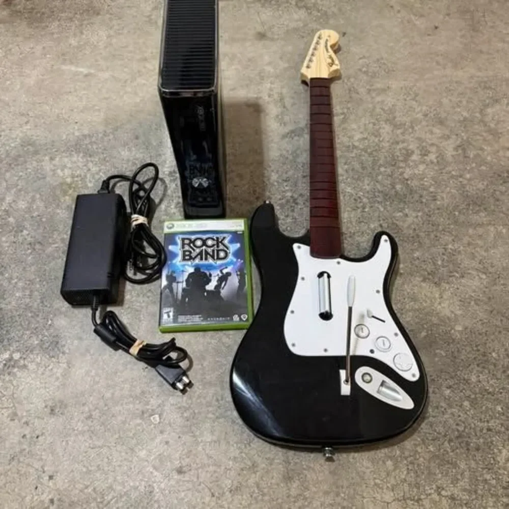Microsoft Xbox 360 S 250 gb Console with Rock Band Guitar and Game
